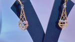 Load and play video in Gallery viewer, Lab Grown Diamonds  Earrings in 92.5 SilverWith Gold Finish
