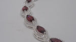 Load image into Gallery viewer, 92.5 Silver Bracelet With Marquise Shaped Garnet And American Diamonds
